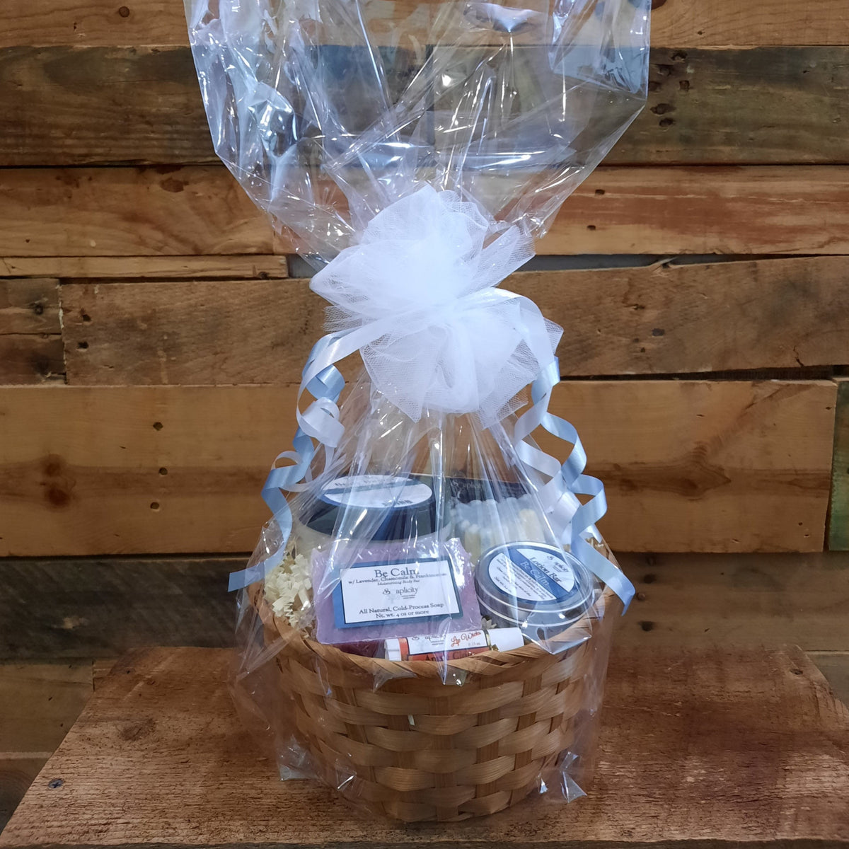 Medium Scentastic gift set basket wrapped in clear plastic with Be Calm body butter and lotion