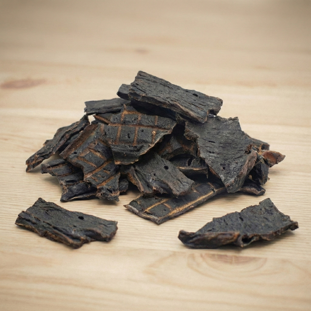 Beef liver jerky strips and shards, dark black