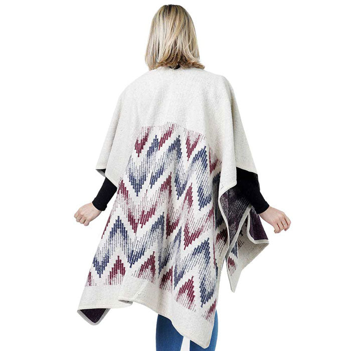 Cream chevron poncho cape shawl wrap with red and blue zigzag pattern on back