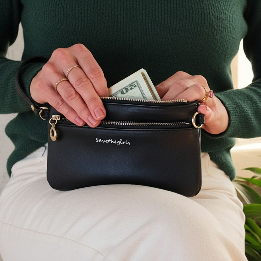 Black RFID crossbody pouch with cash visible in the zippered pocket