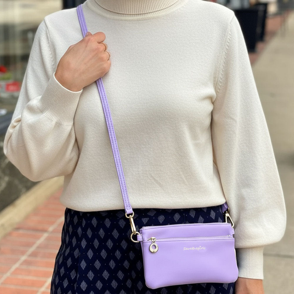 Lavender crossbody RFID wallet worn with adjustable shoulder strap