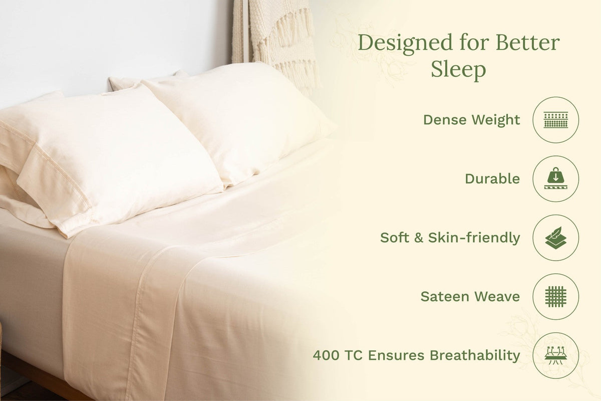 White pillowcases on bed, smooth sateen surface with rectangular shams