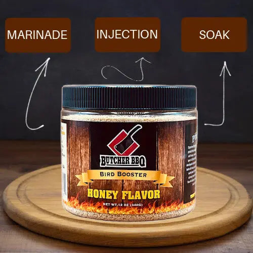 Bird Booster Honey Flavor injection seasoning jar with blue lid on wooden base.