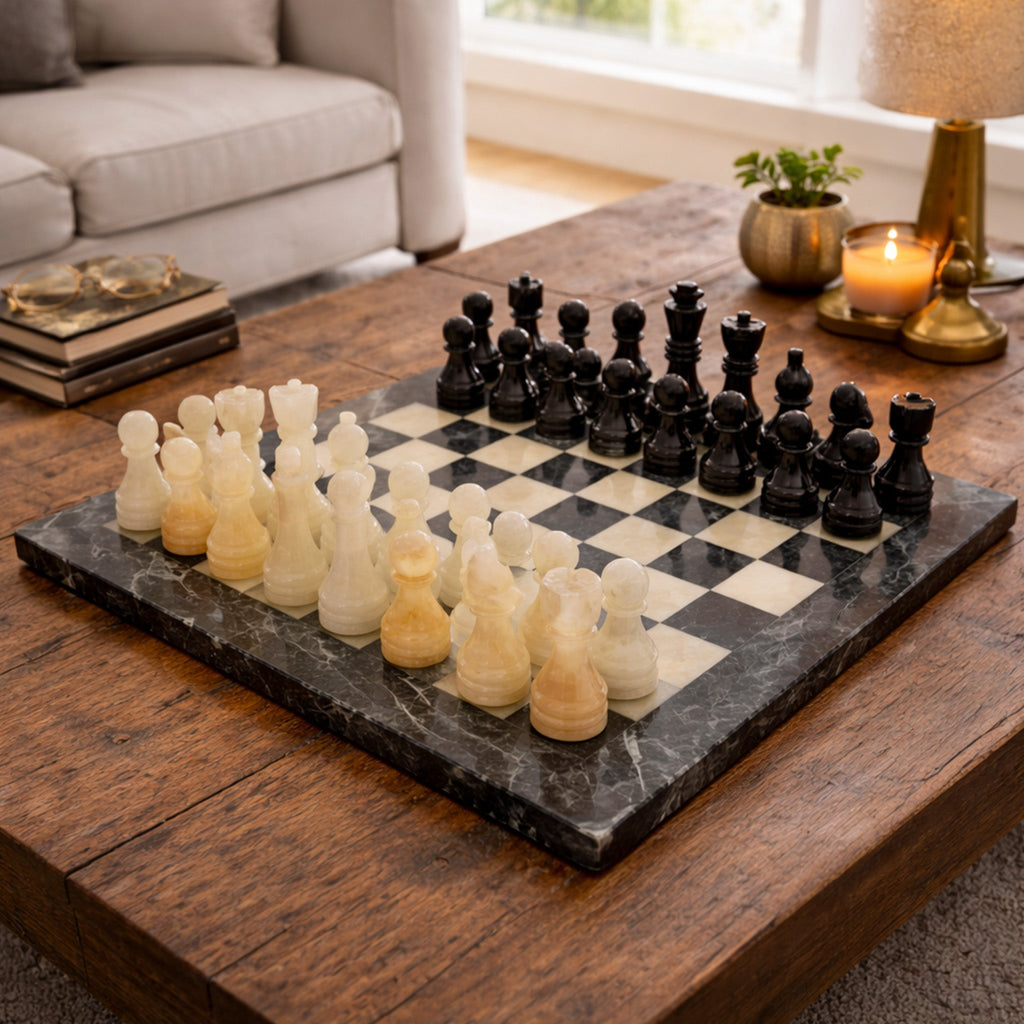 Chess set with black and light onyx pieces on a black-and-white checkered board