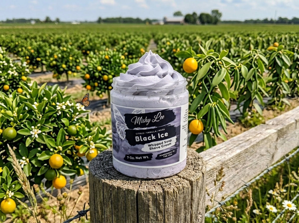 Whipped soap and shave cream jar standing on a fence outdoors in a citrus grove