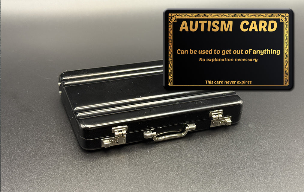 Black mini briefcase with 'AUTISM CARD' insert card overlay.
