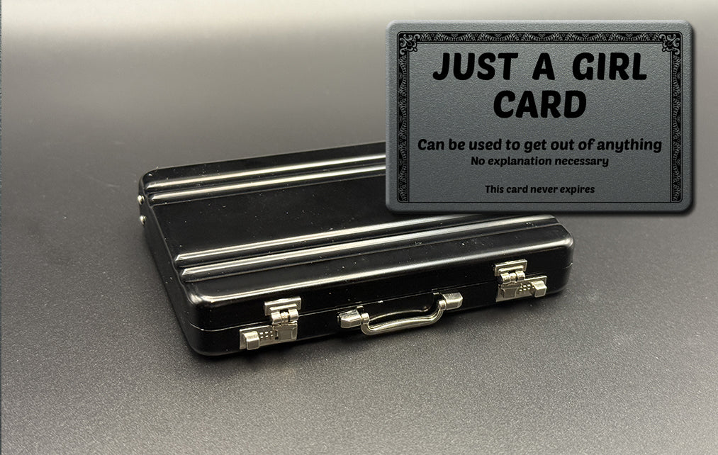 Black mini briefcase with 'JUST A GIRL CARD' insert card overlay.