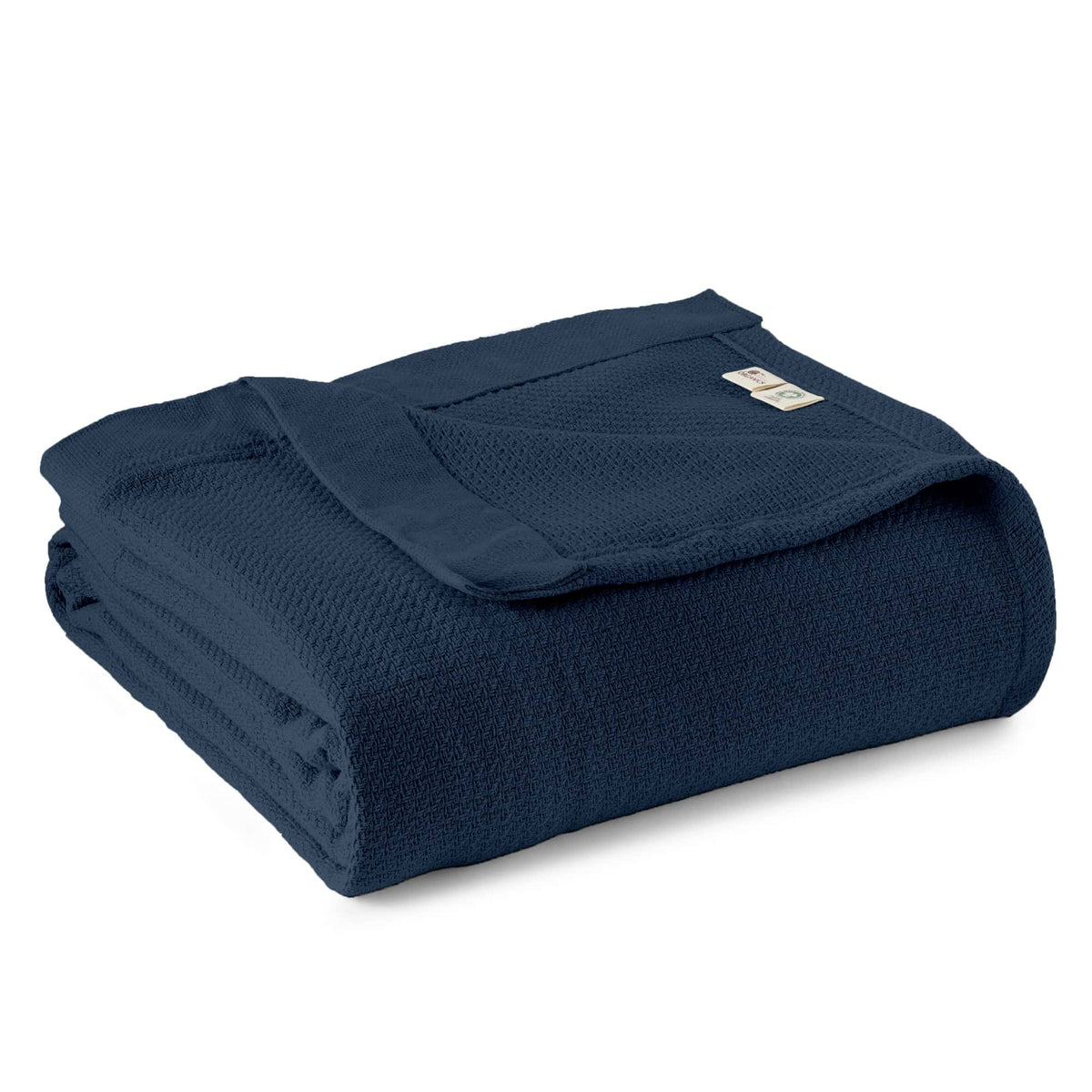 Navy woven blanket folded with textured weave and stitched edge.