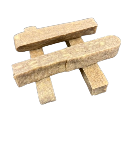 Yak cheese dog chew stick, medium size, light tan rectangular shape
