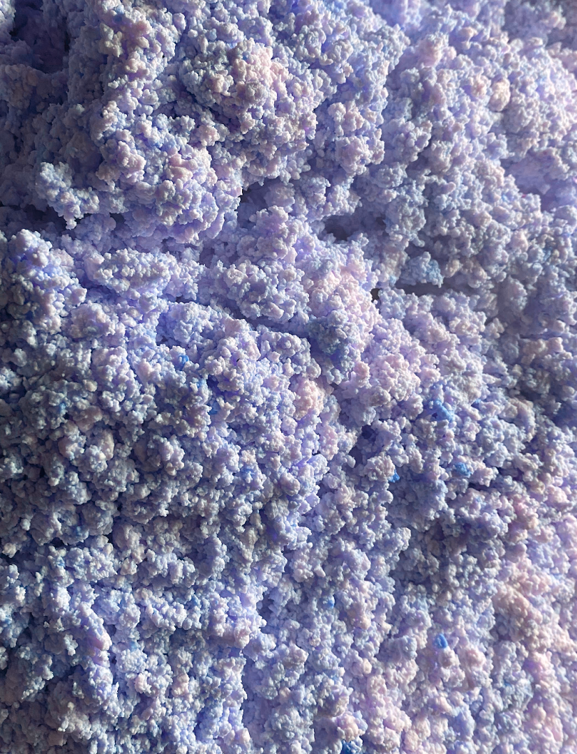 Close-up pile of blueberries with textured skins.