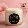 Bombshell scented body butter jar, cream-colored plastic with white lid and black label.