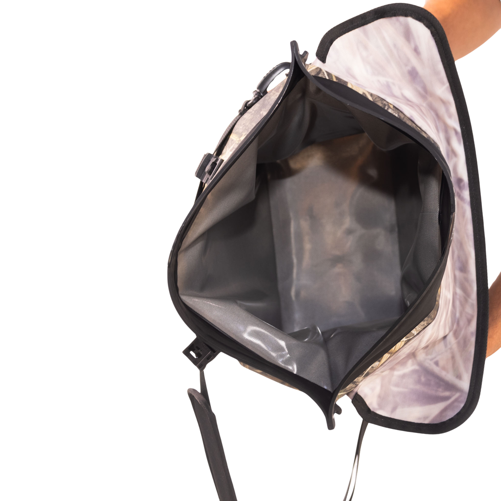 Waterproof floating cooler bag open top showing gray liner and black padded rim