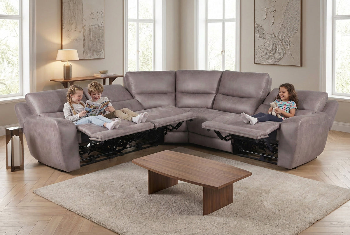 Gray reclining sectional sofa with built-in footrests and deep padded seats