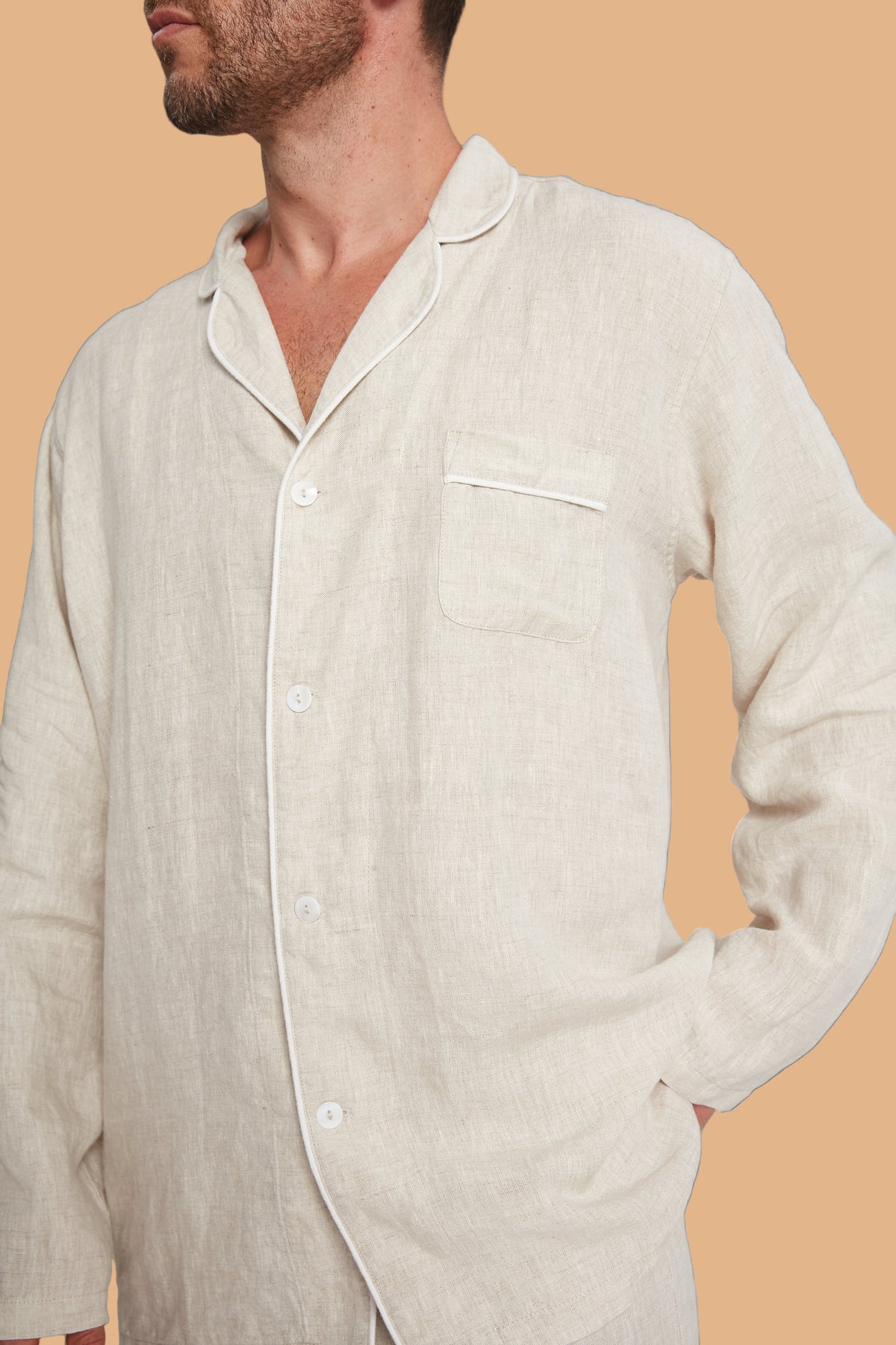 Natural hemp pajama shirt close-up with chest pocket and button placket