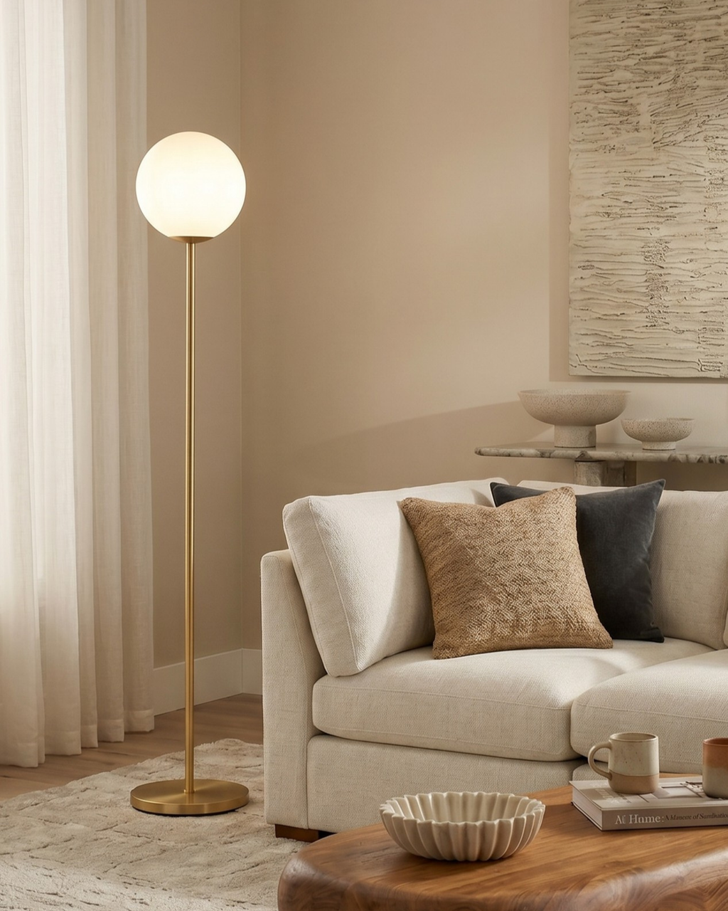 Antique brass LED floor lamp with frosted globe shade and round base
