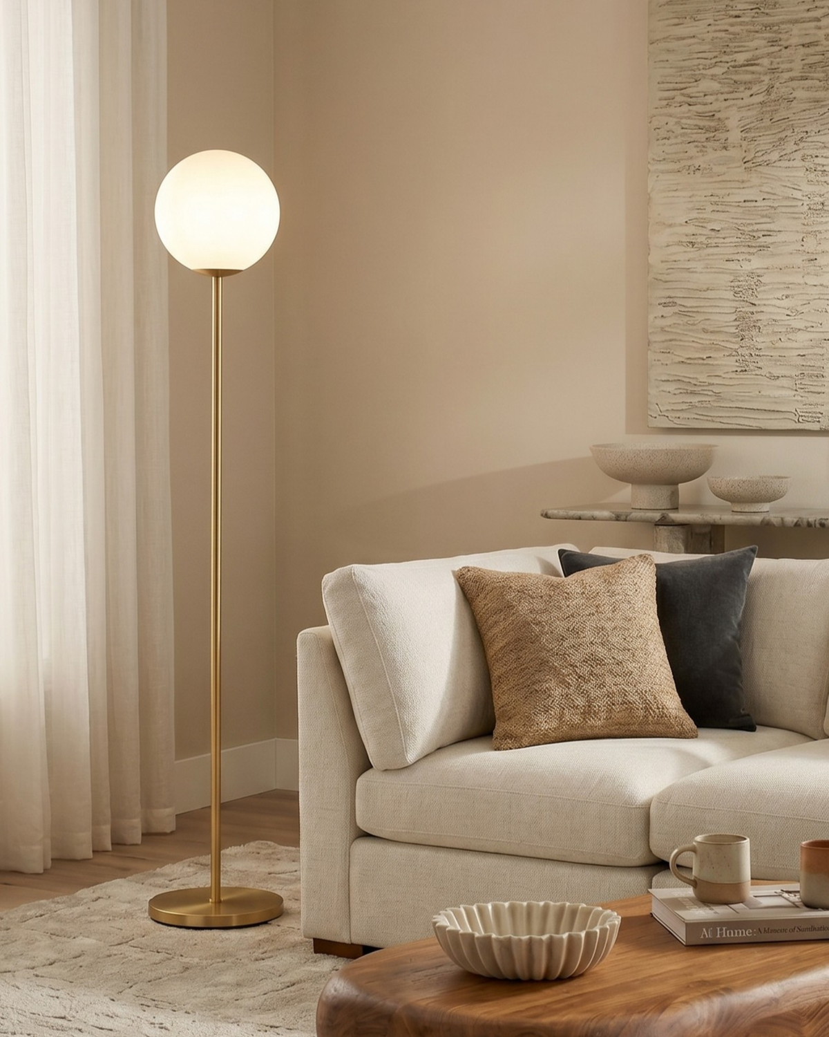 Antique brass LED floor lamp with frosted globe shade and round base