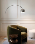 Bronze floor lamp with arched stem and rounded dome shade