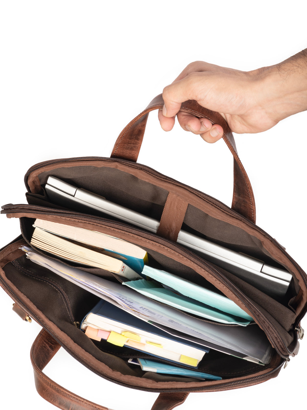 Brown leather laptop briefcase open, showing interior document slots and papers