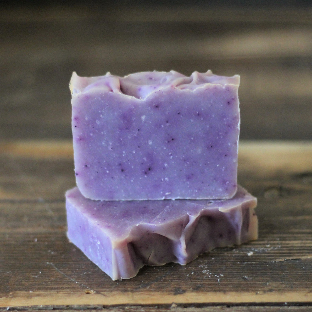 Purple shampoo bar soap, two stacked bars