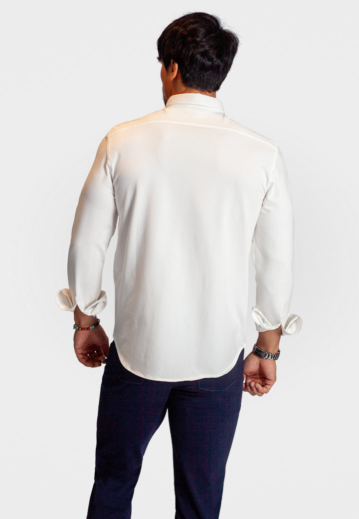White button-front long-sleeve shirt, back view with yoke and curved hem