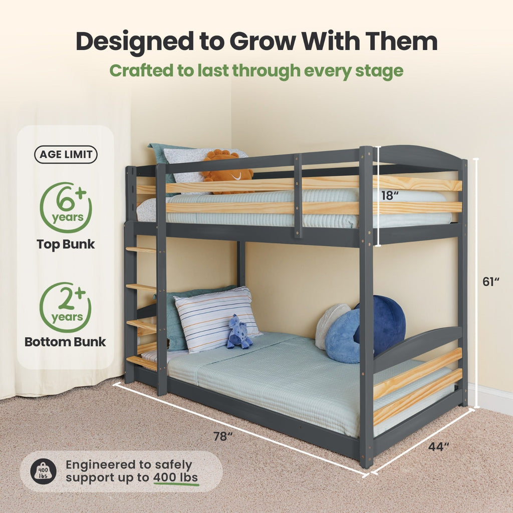 Gray twin-over-twin bunk bed front view with ladder and safety guardrails.