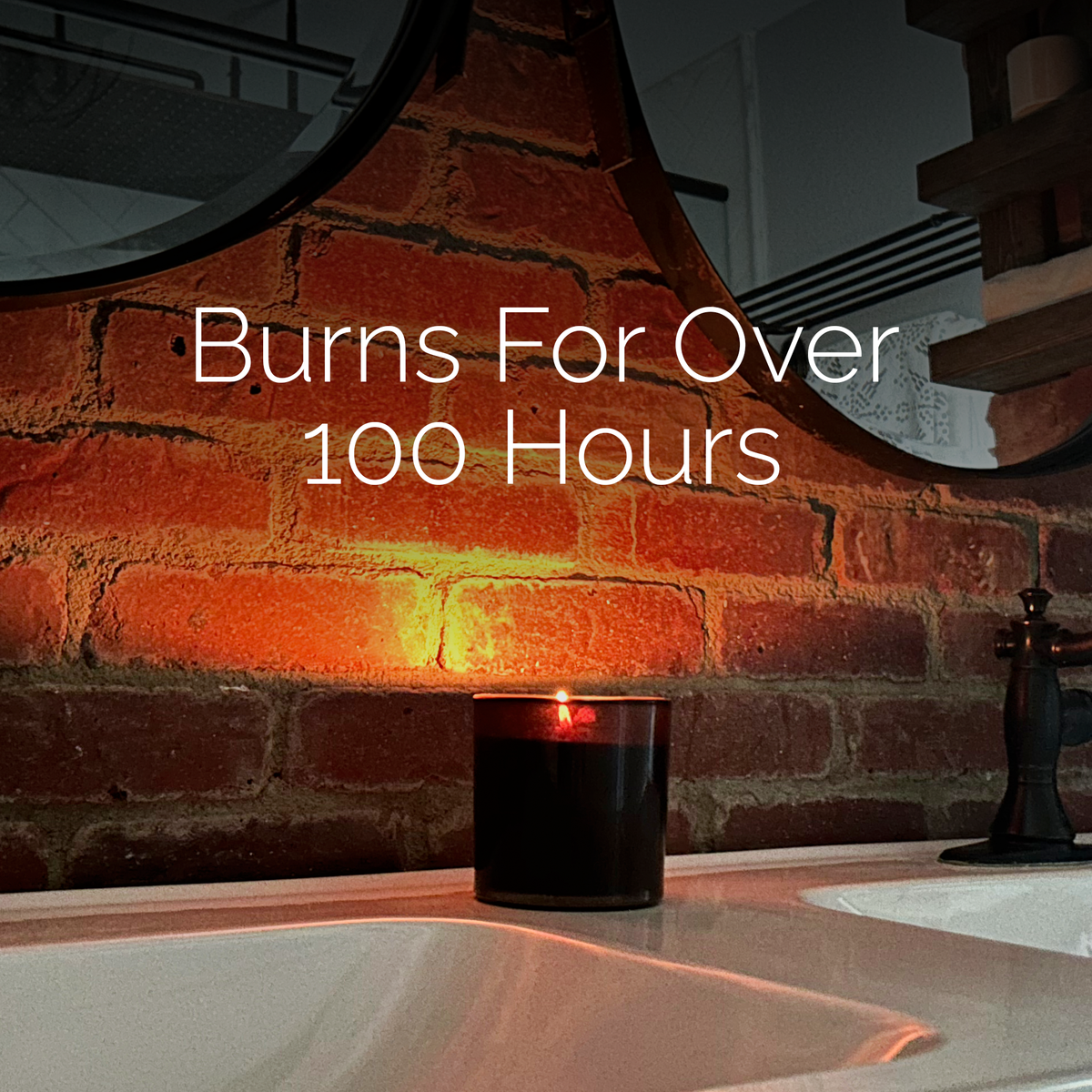 Fireplace-scented soy wax candle burning beside brick fireplace