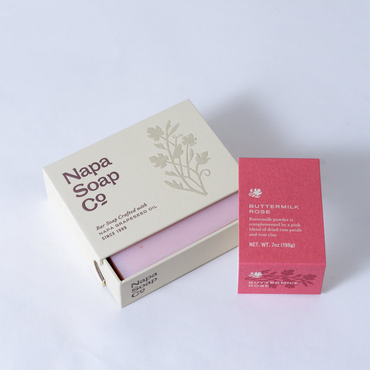 Bar soap gift set with open box, small soap bar and red label panel