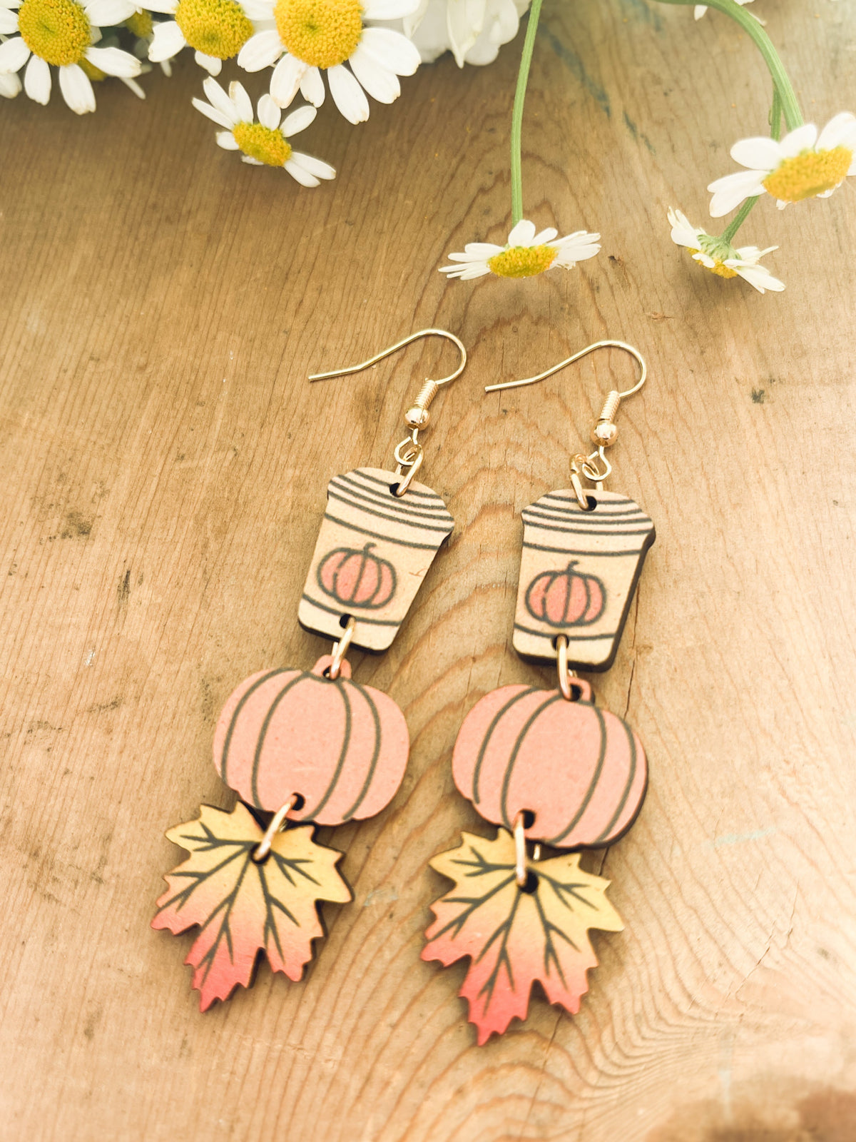 Coffee cup and pumpkin wood earrings with gold hooks and leaf-shaped dangle