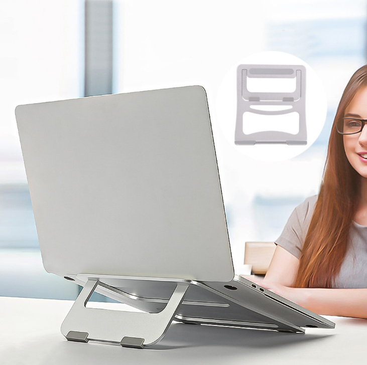 Silver aluminum laptop cooling stand with vented platform supporting a laptop