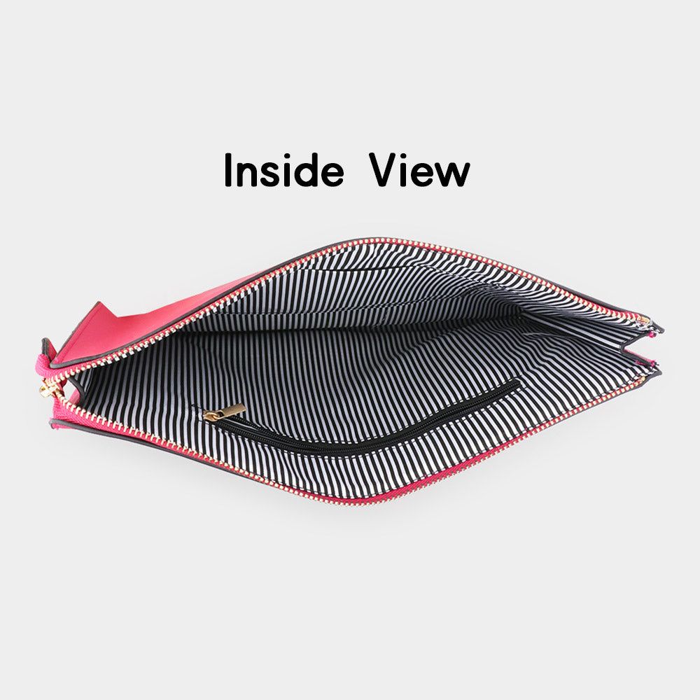 Opened pink faux leather clutch with black-and-white striped interior lining
