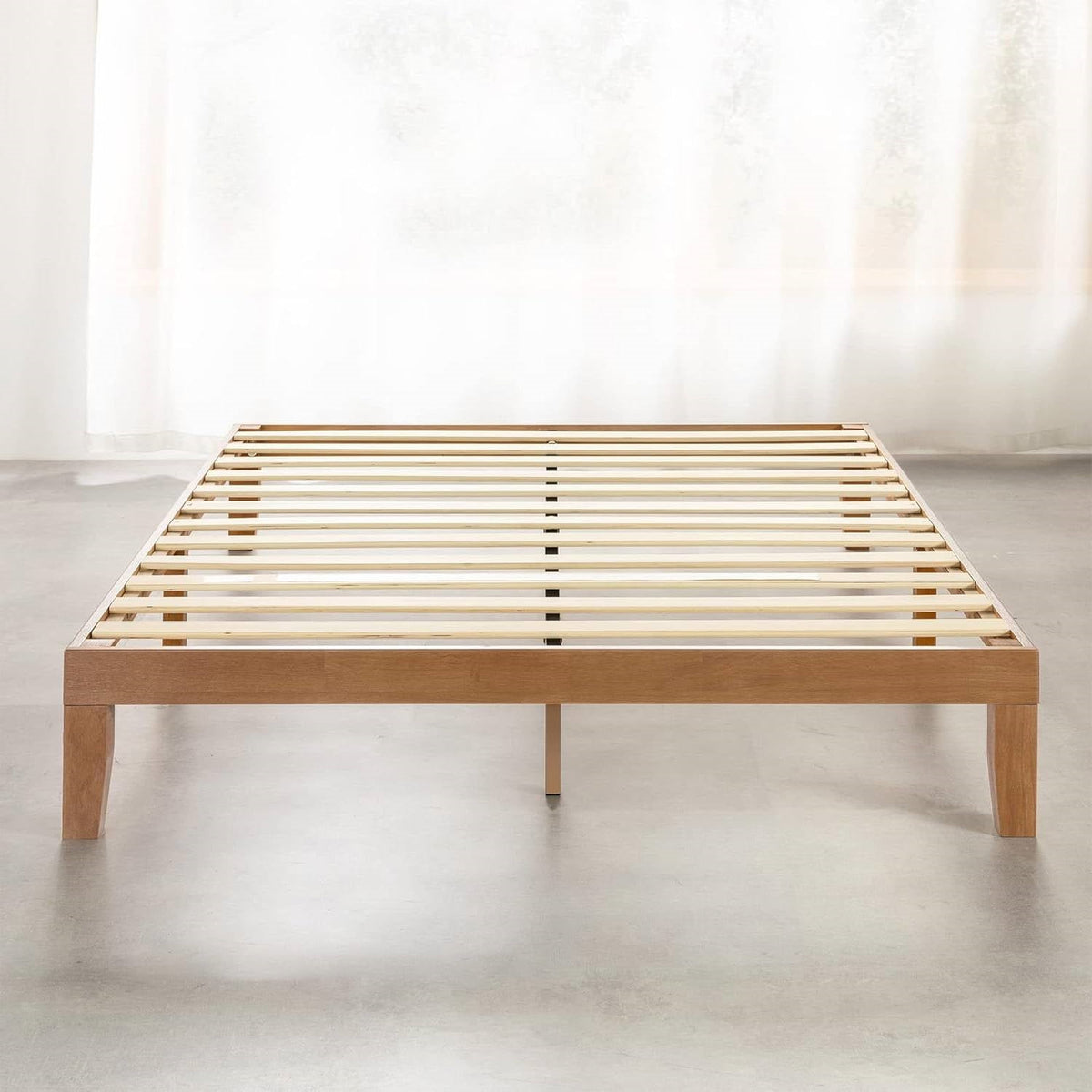Natural wood platform bed frame with exposed support slats