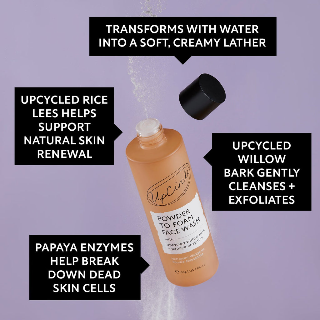 UpCircle powder to foam face wash bottle with black cap, amber