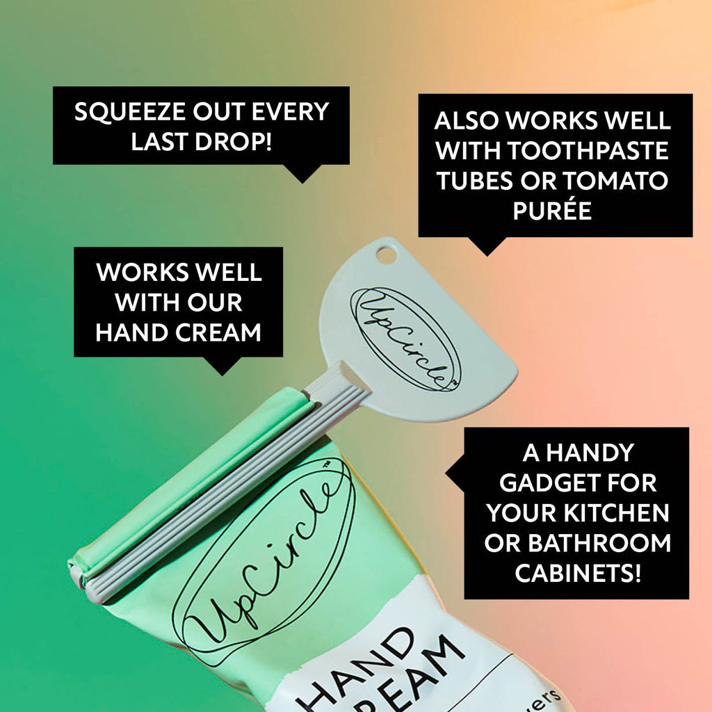 UpCircle green hand cream tube with squeeze and usage callouts