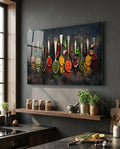 Glass wall art with a row of colorful spice spoon illustrations on a dark background