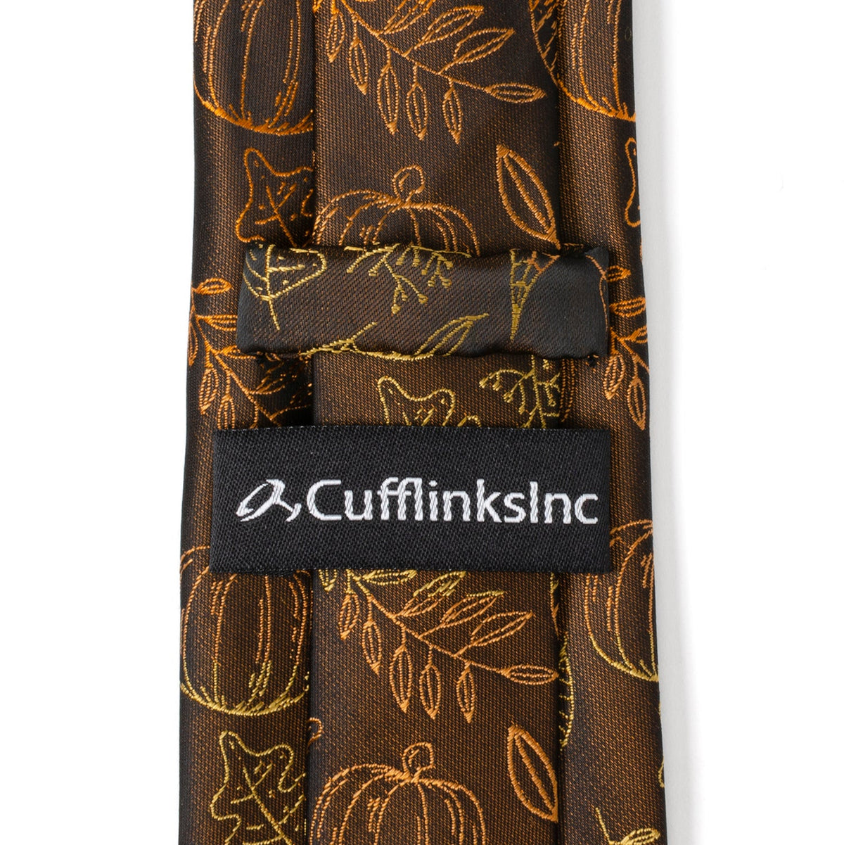 Men's brown tie with gold fall pattern and 'CufflinksInc' label