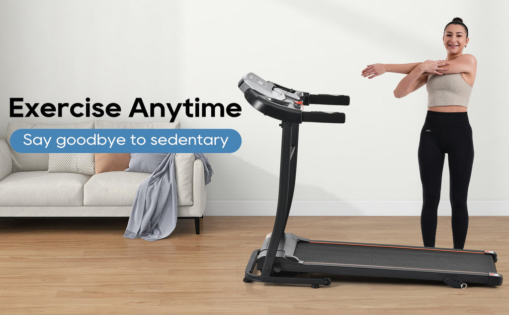 Black folding treadmill with handrails and console for home workouts