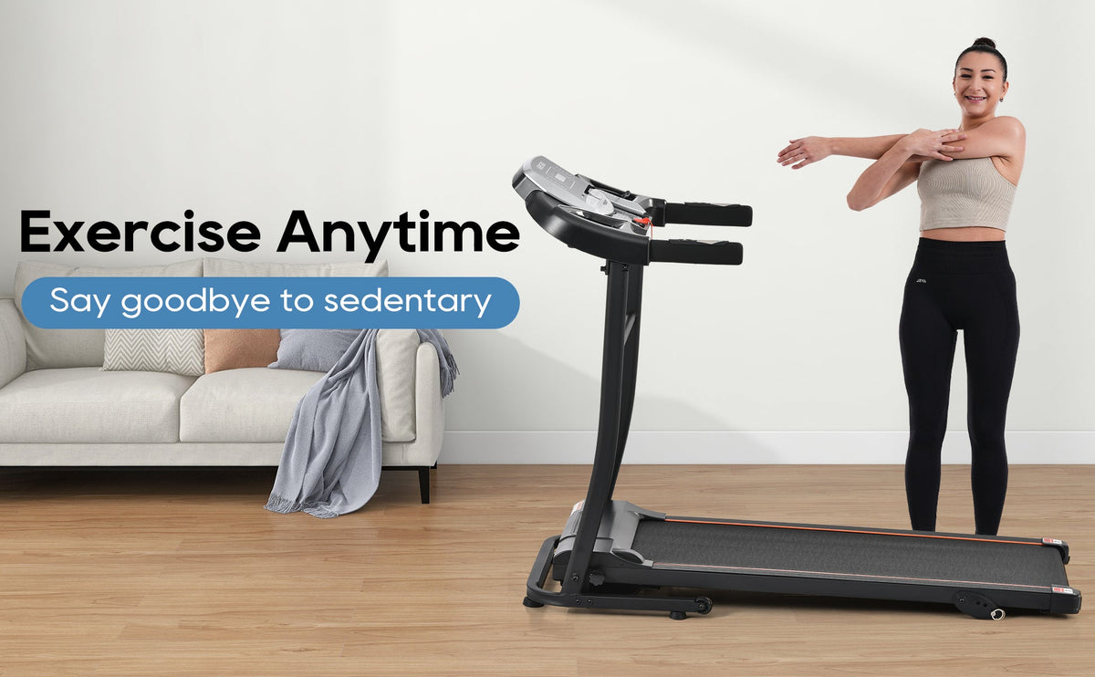 Black folding treadmill with handrails and console for home workouts