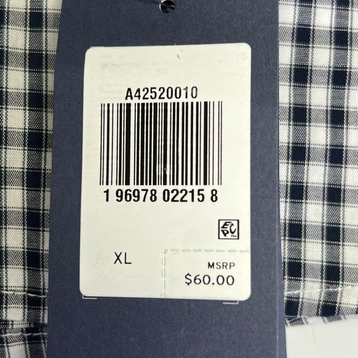 Shirt tag close-up showing size XL, price $60.00, code A42520010