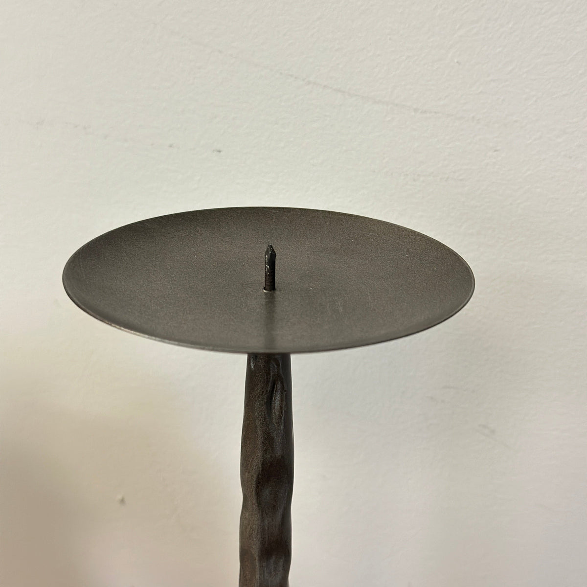 Hammered metal candle holder top plate with central candle spike