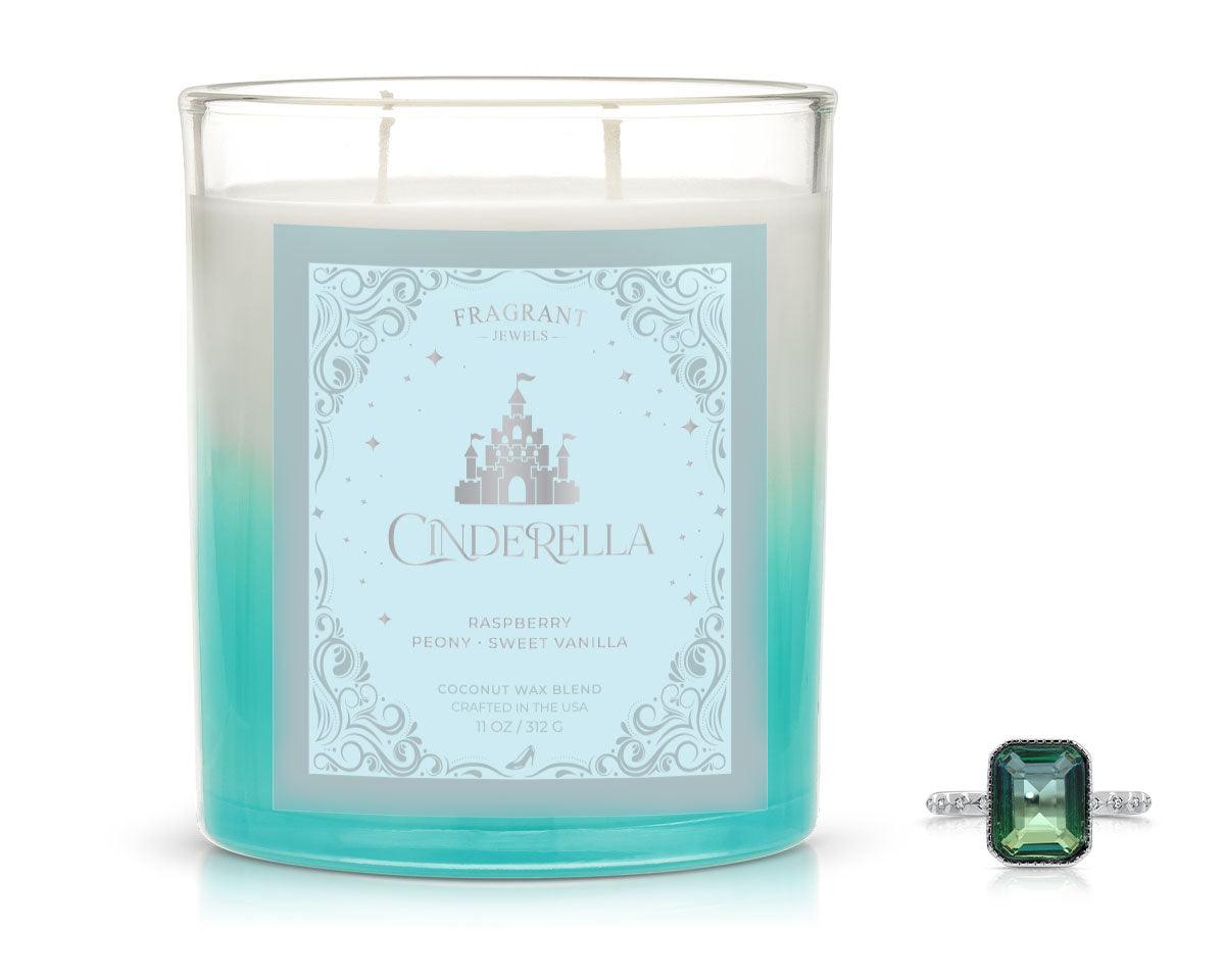 Blue wax jewel candle in frosted glass with green gemstone ring accessory