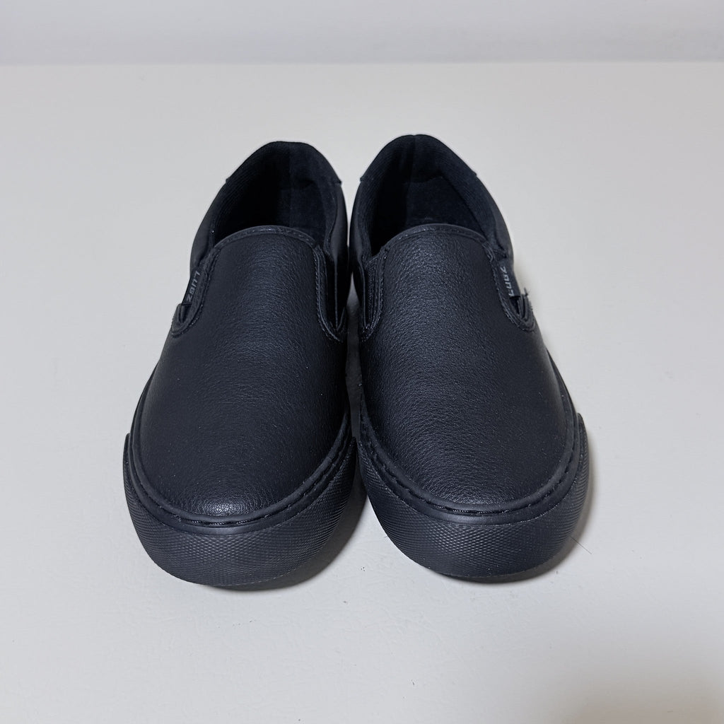 Black slip-on work shoes with rear heel seam and cushioned back collar