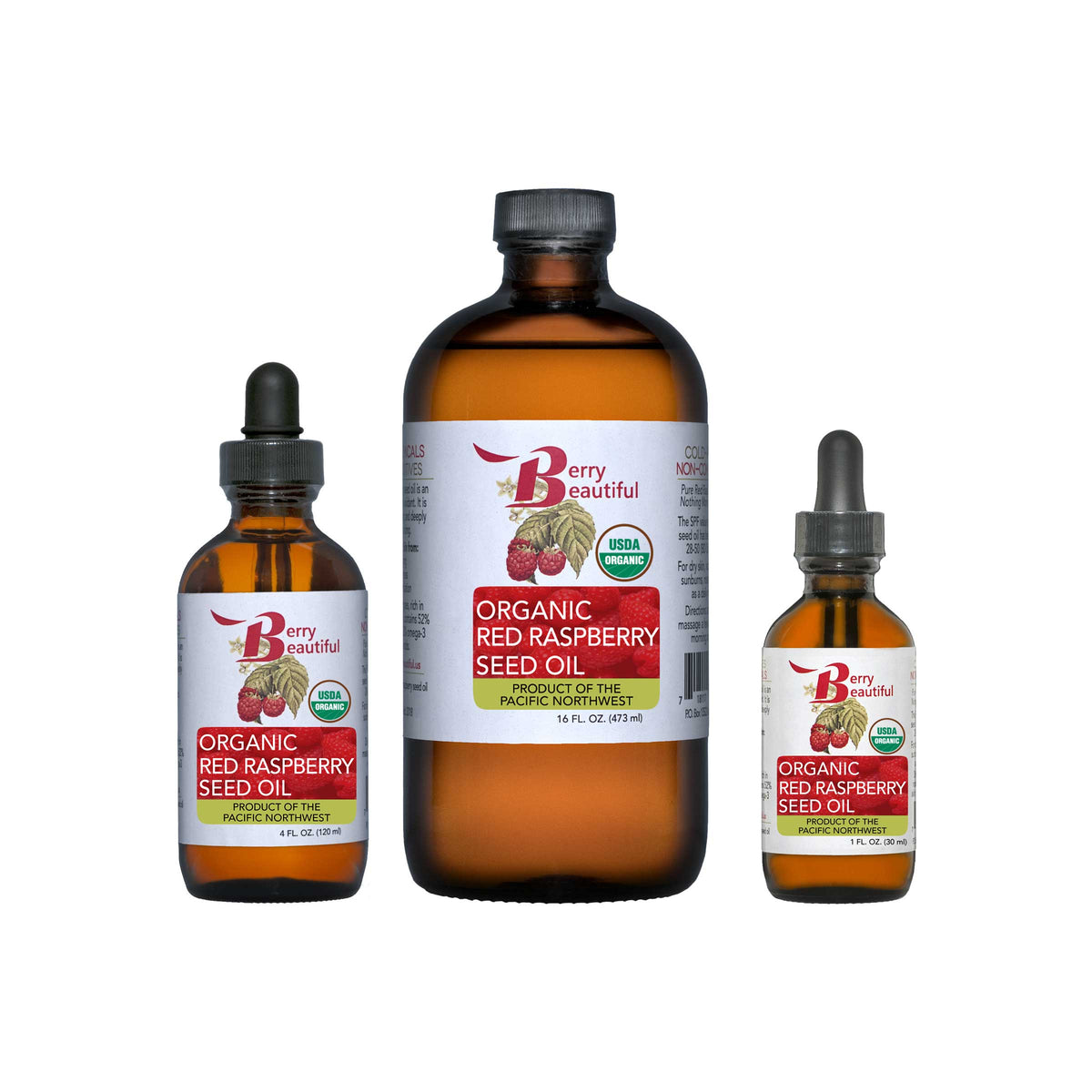 Set of organic red raspberry seed oil bottles, amber glass with black dropper caps
