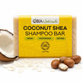 OBIA Naturals Coconut Shea shampoo bar, yellow wrapped soap bar with coconut shells
