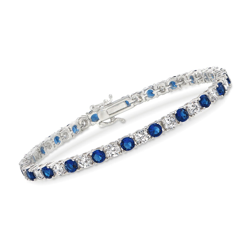 Tennis bracelet with blue and clear round stones, silvertone prong setting