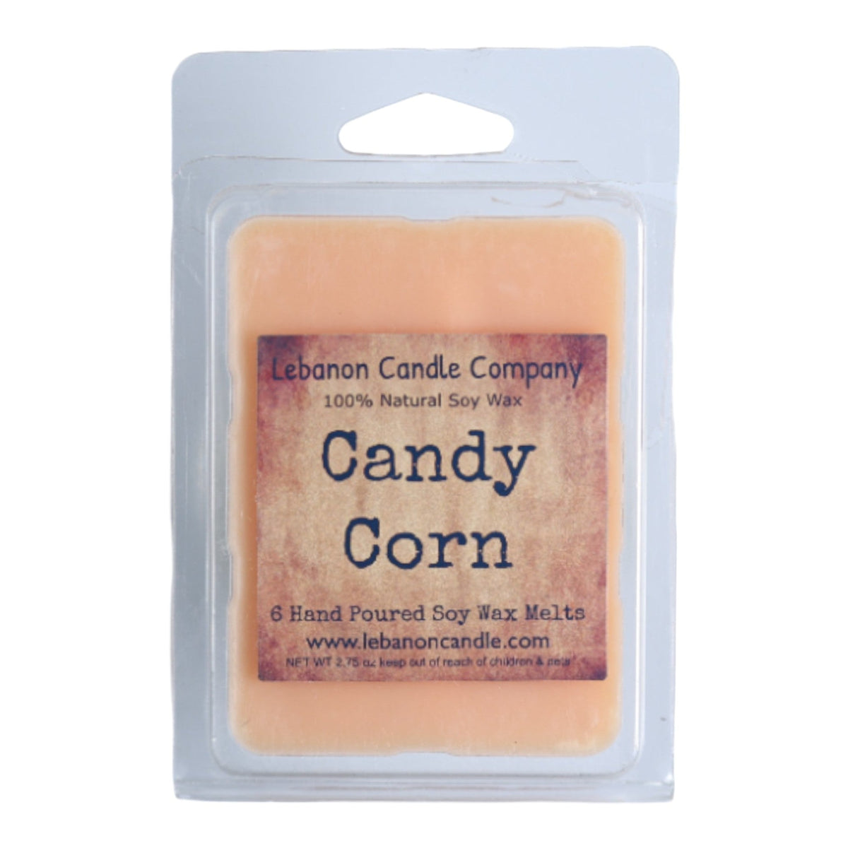 Candy corn wax melt package with pale orange soy wax bar inside