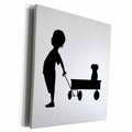 Gallery-wrapped canvas art: boy silhouette leads a puppy in a wagon, black-on-light background.