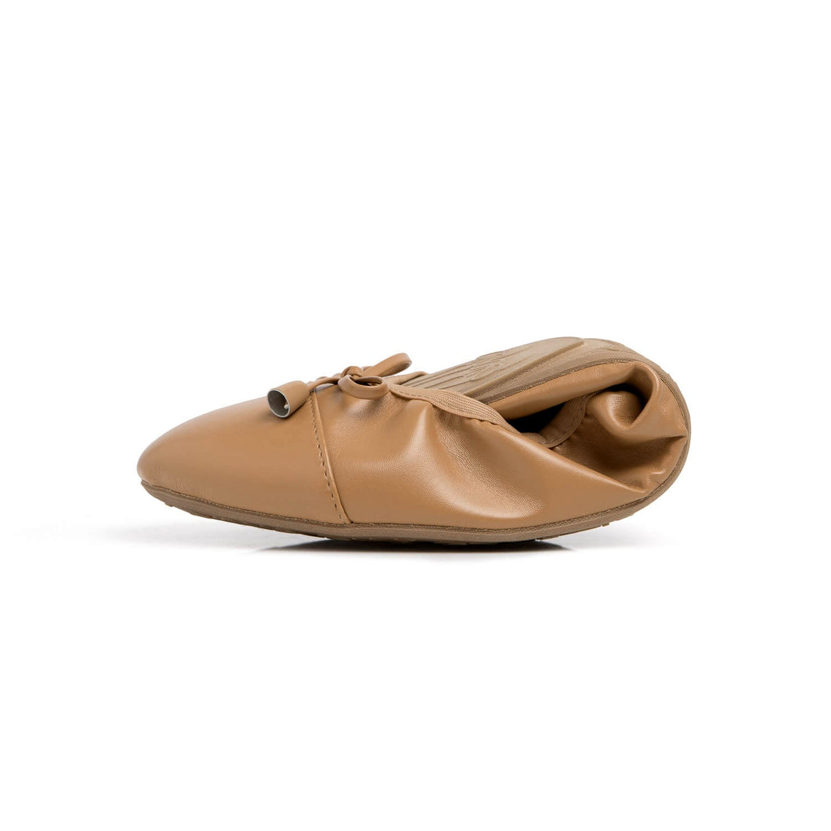 Caramel flat shoe with tie bow, low profile sole, side view