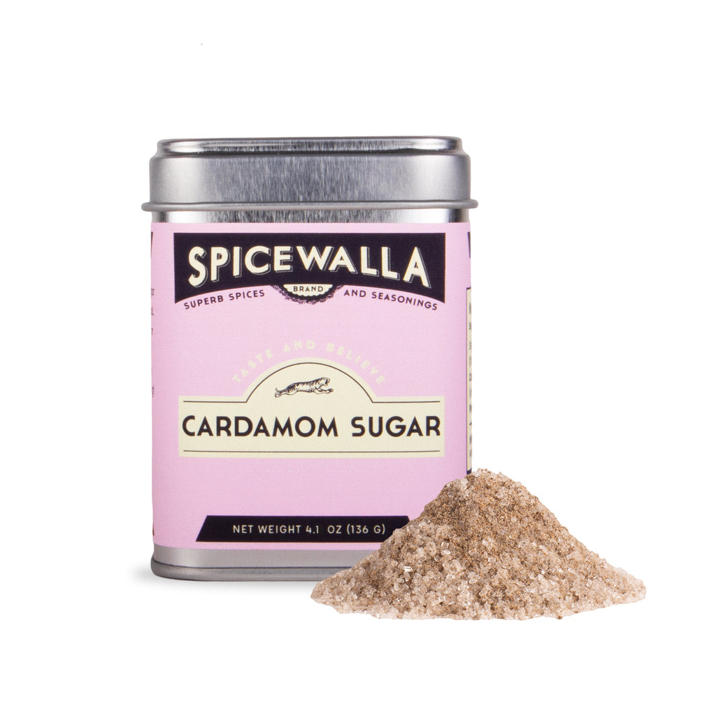 Cardamom sugar seasoning tin with spice pile, SPICEWALLA label on pink canister