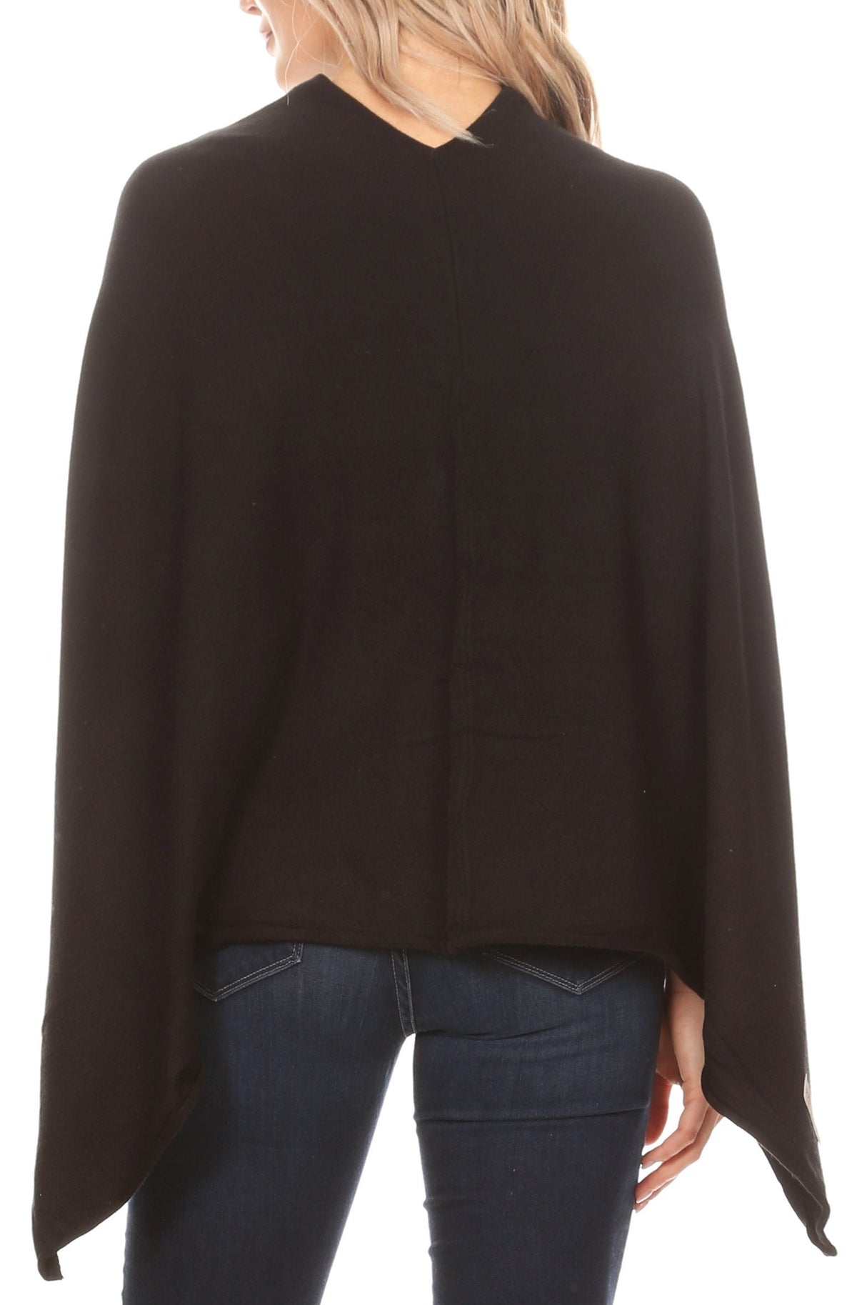 Black cape poncho pullover shown from back with high neckline and draped hem