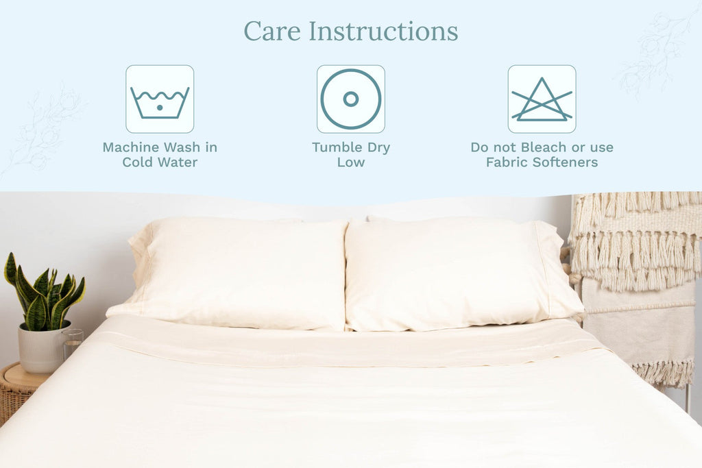Organic sateen pillowcases on bed, light off-white color, envelope closure